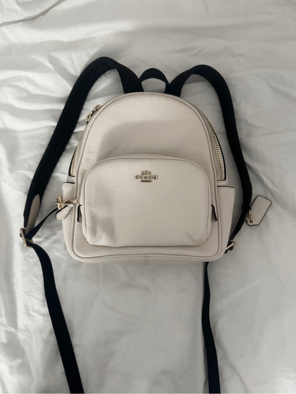 Coach Pebble Leather Mini Backpack in Cream with Black Straps